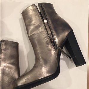 CALVIN KLEIN silver Matte Metallic zipup booties.